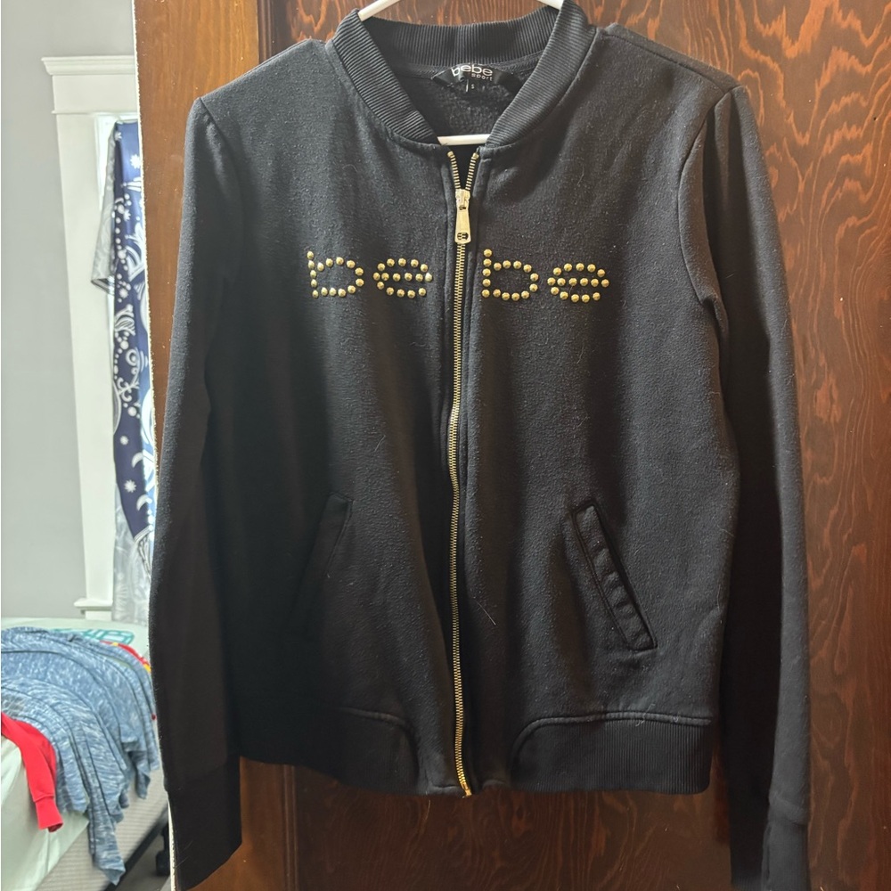 Bebe Sport Black with Gold Accents Zip Up Sweater Woman’s Size Small